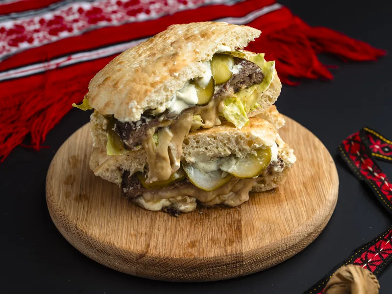 Smoked-cheese-filled pljeskavica in flatbread, at Trafika