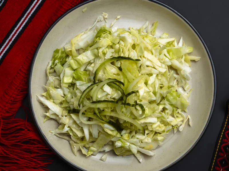 Fresh white cabbage salad, side dish at Trafika