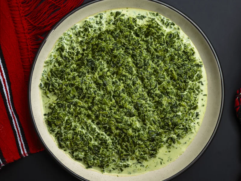 Spinach with garlic and sour cream, side dish at Trafika